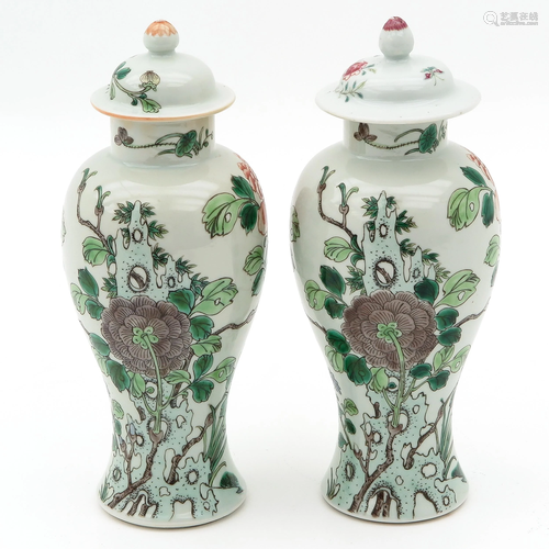 A Pair of Vases with Covers