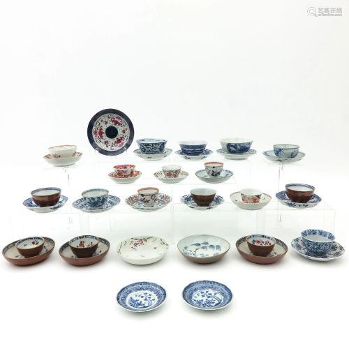 A Large Collection of Cups and Saucers