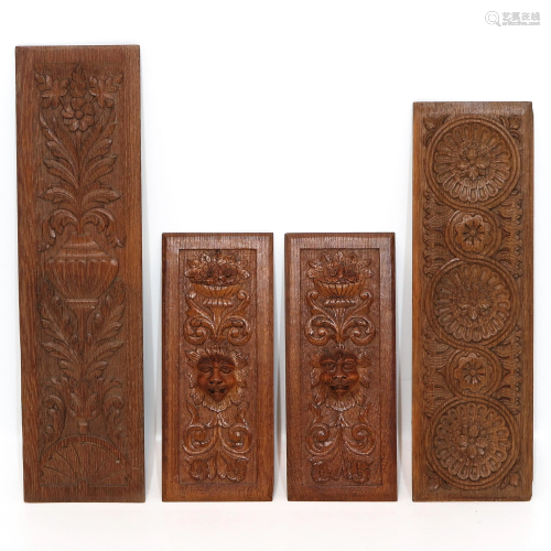 A Collection of 4 Carved Oak Wood Panels