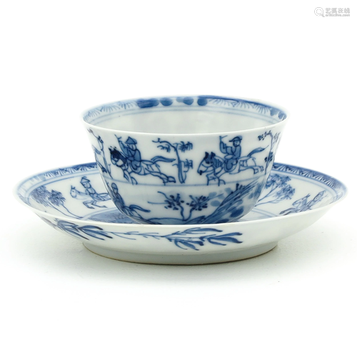 A Blue and White Cup and Saucer