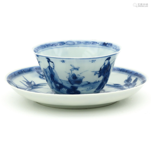 A Blue and White Cup and Saucer