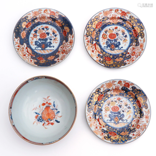 An Imari Serving Bowl and 3 Plates