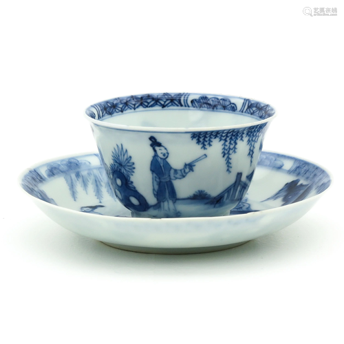 A Blue and White Cup and Saucer