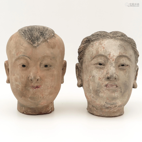 Two Chinese Clay Temple Heads