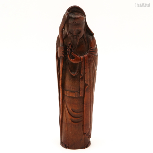 A Carved Bamboo Chinese Figure