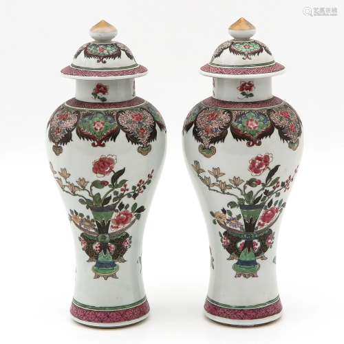 A Pair of Famille Rose Garniture Vases