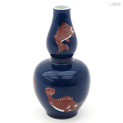 A Blue and Red Gourd Vase