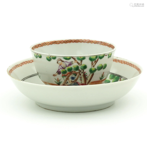 A Polychrome Decor Cup and Saucer