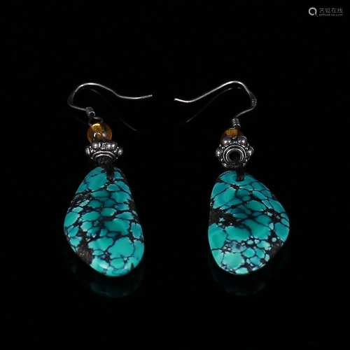 A pair of Qing Dynasty turquoise earrings