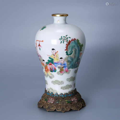 Qing dynasty famille-colored boy offering a plum vase