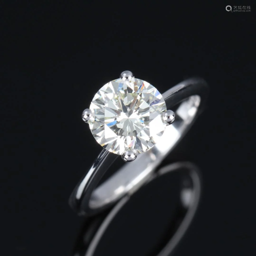 A 18k white gold ring with a large brilliant-cut
