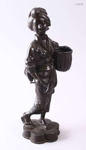 A JAPANESE MEIJI STYLE METAL OKIMONO OF A GEISHA GIRL HOLDING A BASKET, 28CM.