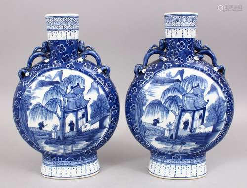 A GOOD PAIR OF 18TH / 19TH CENTURY CHINESE BLUE & WHITE PORCELAIN MOON FLASK VASES, both decorated