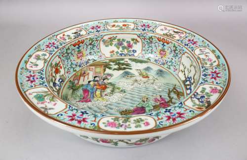 A LARGE CHINESE FAMILLE ROSE PORCELAIN BASIN, with panel decoration, of native floral decoration and