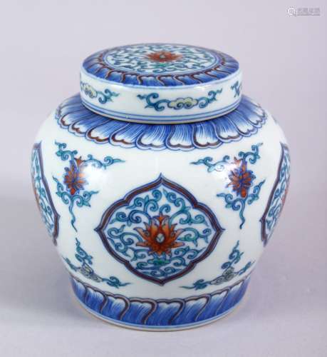 A GOOD CHINESE DOUCAI PORCELAIN GINGER JAR AND COVER, the body with panels of formal scrolling