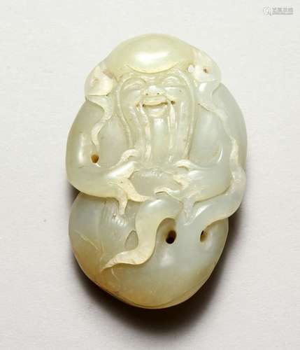 A GOOD CHINESE CARVED JADE PEBBLE OF SHOU LAO, the carving depicting shou lao god of longevity, 7.