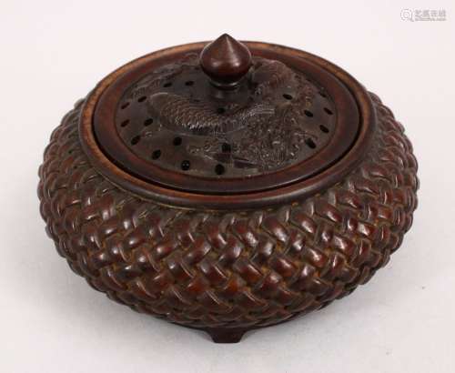 A GOOD CHINESE 20TH CENTURY CARVED WOODEN CARP CENSER, the censer carved in basket weave form,