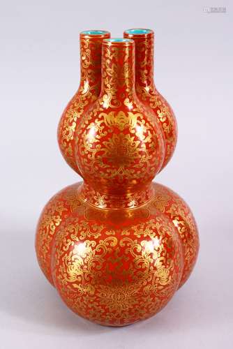 A FINE CHINESE CORAL GROUND TULIP SHAPED PORCELAIN VASE, the body of the tulip / gourd shaped vase