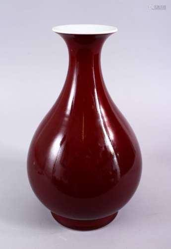 A LARGE CHINESE RED GLAZED YUHUCHUN PORCELAIN VASE, The base with a six character mark, 31cm high.