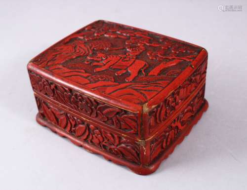 A 19TH / 20TH CENTURY CHINESE CINNABAR LACQUER LIDDED BOX, depicting a man upon elephant in a