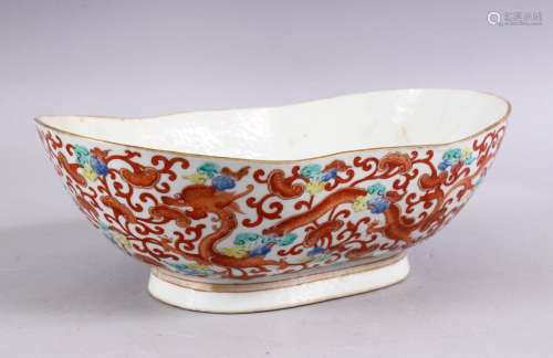 A 19TH CENTURY CHINESE IRON RED PORCELAIN DRAGON BOWL, the body decorated with scenes of dragons and
