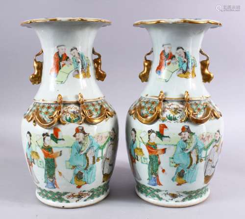 A FINE PAIR OF 19TH CENTURY CHINESE CANTON FAMILLE ROSE PORCELAIN VASES, the vases decorated with