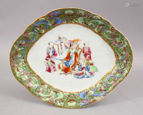 AN UNUSUAL 19TH CENTURY CHINESE CANTON FAMILLE ROSE PORCELAIN DRAGON DISH, the central panel