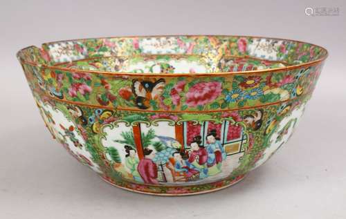 A LARGE 19TH CENTURY CHINESE CANTON FAMILLE ROSE PORCELAIN BOWL, with panel decoration of figures,