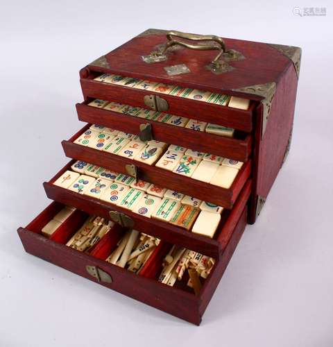 A GOOD CHINESE HARDWOOD & METAL MOUNTED MAHJONG GAMES SET, with five drawers that appear to be