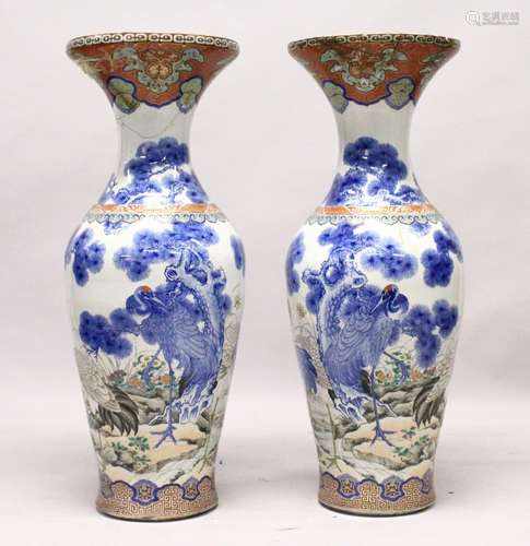 A LARGE PAIR OF JAPANESE MEIJI PERIOD BLUE AND WHITE PORCELAIN IMARI VASES, the body of the vases