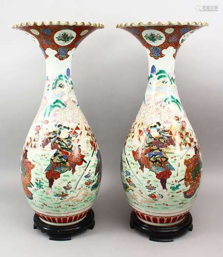 A LARGE PAIR OF JAPANESE MEIJI PERIOD FLARED TOP PORCELAIN KUTANI WARRIOR VASES, each of the vases