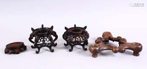 A MIXED LOT OF 19TH / 20TH CENTURY CARVED CHINESE HARDWOOD STANDS, each of varying size and style.