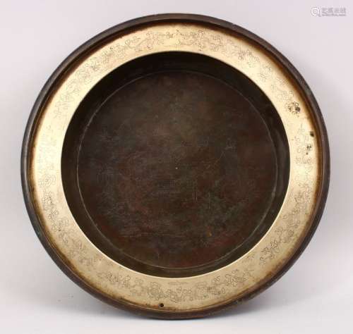 A GOOD CHINESE PAKTONG METAL ALLOY BASIN, carved with prunus decoration and a view of a landscape,