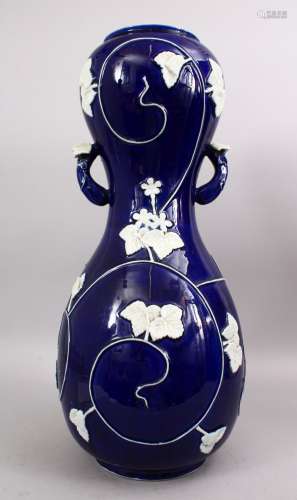 A GOOD LARGE 19TH CENTURY CHINESE POWDER BLUE MOULDED PORCELAIN DOUBLE GOURD VASE, with moulded