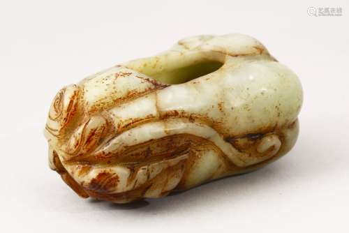 A GOOD 20TH CENTURY CHINESE CARVED JADE BRUSH WASH IN THE FORM OF A FRUIT, 9cm wide.