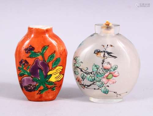 TWO 19TH / 20TH CENTURY CHINESE SNUFF BOTTLES, one porcelain with coral ground and decoration of