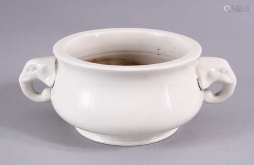 A CHINESE DEHUA BOMBE FORM TWIN HANDLE PORCELAIN CENSER, with twin elephant mask handles, the base