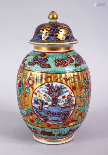 A FINE 18TH CENTURY CHINESE POLY CHROME ENAMEL DECORATED PORCELAIN JAR & COVER, the ribbed body with