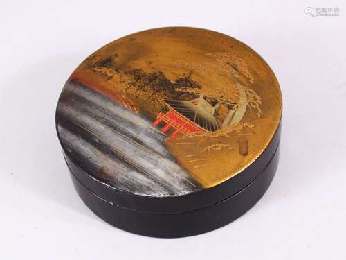 A 20TH CENTURY CHINESE LACQUER CIRCULAR BOX & COVER, decorated with native waterside views , 12cm