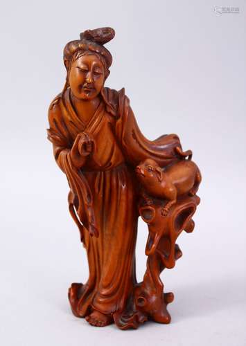 A CHINESE CARVED WOODEN FIGURE OF GUANYIN & ANIMAL, stood aside a tree stump with an a animal,