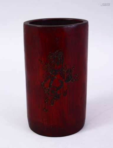 A GOOD 19TH CENTURY CHINESE CARVED BAMBOO BRUSH WASH, carved with a dragon and calligraphy, 14cm.