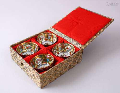 FOUR CHINESE REPUBLIC STYLE PORCELAIN CUPS IN BOX, decorated upon a gilt ground with flora and