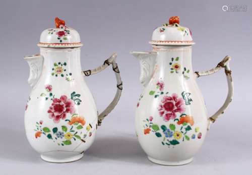 A PAIR OF 18TH CENTURY CHINESE FAMILLE ROSE PORCELAIN COFFEE POTS & COVERS, both decorated with