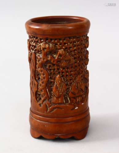 A GOOD 19TH CENTURY CHINESE CARVED BAMBOO BRUSH POT, carved in deep relief to depict immortals