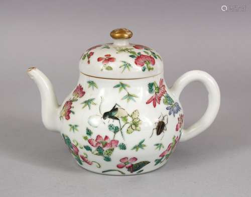 A CHINESE FAMILLE ROSE PORCELAIN TEA POT AND COVER, decorated with insects and sprays of native