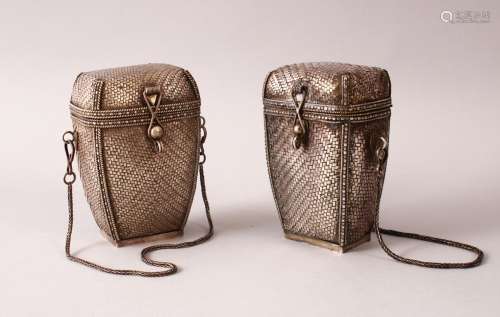 A GOOD PAIR OF JAPANESE MEIJI PERIOD SILVER WOVEN SILVER LIDDED BASKETS, both with chains, 10cm high