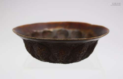 A GOOD CHINESE BRONZE ARCHAIC MOULDED DISH, the dish decorated with archaic form, the base with a