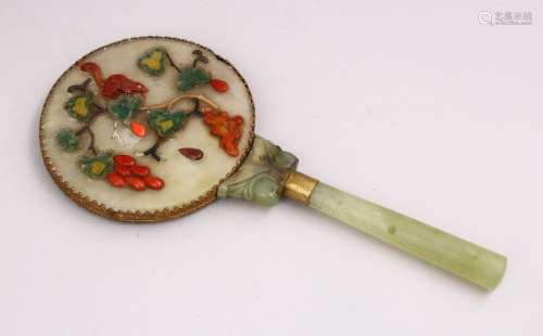 A 19TH / 20TH CENTURY CHINESE CARVED JADE / HARDSTONE MIRROR, the handle cylindrical formed, the top