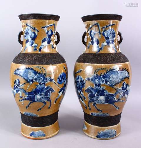 A PAIR OF 19TH CENTURY CHINESE BISCUIT & UNDERGLAZE BLUE PORCELAIN WARRIOR VASES, Decorated with