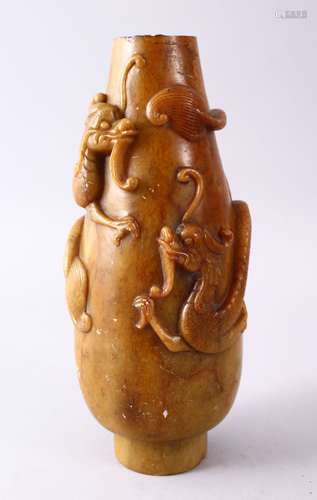 A 19TH CENTURY CHINESE CARVED SOAPSTONE VASE WITH CHILONG, the body with climbing chilong, top